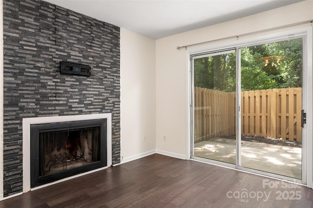 6013 Heath Valley Rd, Charlotte, NC 28210 - unfurnished living room featuring wood finished floors and a fireplace