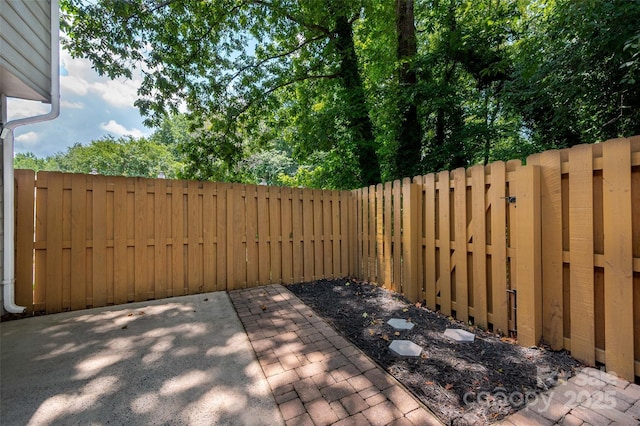 6013 Heath Valley Rd, Charlotte, NC 28210 - wooden deck featuring a patio