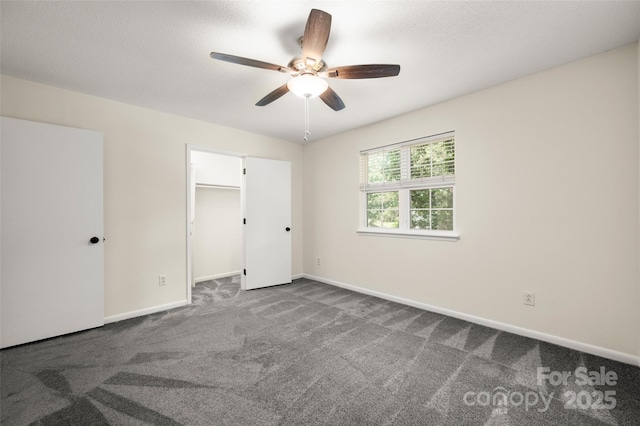 6013 Heath Valley Rd, Charlotte, NC 28210 - unfurnished bedroom featuring dark colored carpet and a ceiling fan