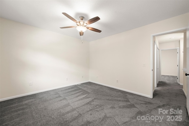 6013 Heath Valley Rd, Charlotte, NC 28210 - empty room with ceiling fan and dark carpet