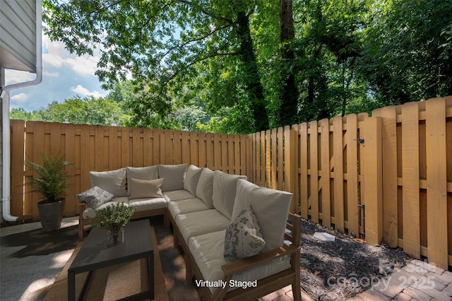 6013 Heath Valley Rd, Charlotte, NC 28210 - fenced backyard featuring outdoor lounge area and a patio