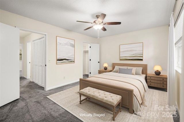 6013 Heath Valley Rd, Charlotte, NC 28210 - carpeted bedroom with baseboards and a ceiling fan