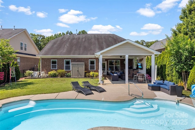 116 Kentmere Ln, Clover, SC 29710 - back of house with an outdoor hangout area, ceiling fan, brick siding, a patio area, and roof with shingles