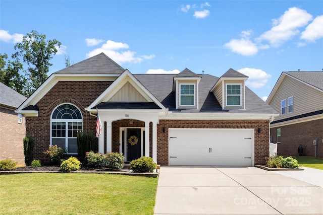 116 Kentmere Ln, Clover, SC 29710 - view of front facade with brick siding, a front yard, driveway, and a garage