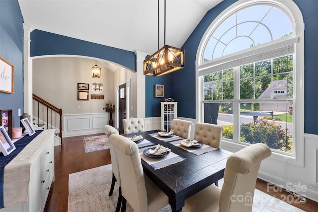 116 Kentmere Ln, Clover, SC 29710 - dining space featuring healthy amount of natural light, arched walkways, wood finished floors, a wainscoted wall, and lofted ceiling