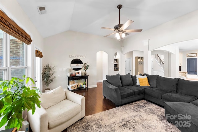 116 Kentmere Ln, Clover, SC 29710 - living area with arched walkways, ceiling fan, stairway, dark wood-style floors, and vaulted ceiling