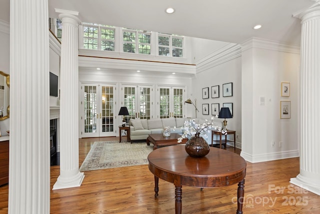 117 Founders Dr, Flat Rock, NC 28731 - living room with decorative columns, healthy amount of natural light, a high ceiling, ornamental molding, and recessed lighting