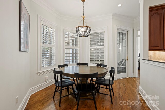 117 Founders Dr, Flat Rock, NC 28731 - dining space with a chandelier, dark wood-type flooring, ornamental molding, and recessed lighting