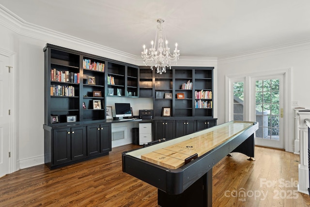 117 Founders Dr, Flat Rock, NC 28731 - office featuring built in study area, a chandelier, crown molding, and dark wood-style floors
