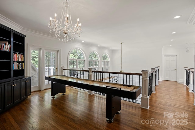 117 Founders Dr, Flat Rock, NC 28731 - recreation room with healthy amount of natural light, ornamental molding, wood finished floors, a chandelier, and recessed lighting