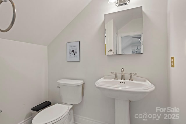 117 Founders Dr, Flat Rock, NC 28731 - bathroom featuring toilet and vaulted ceiling