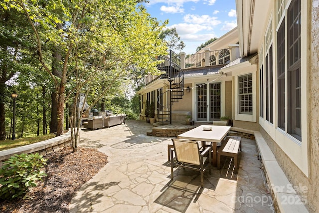 117 Founders Dr, Flat Rock, NC 28731 - view of patio featuring an outdoor living space, stairway, and outdoor dining area