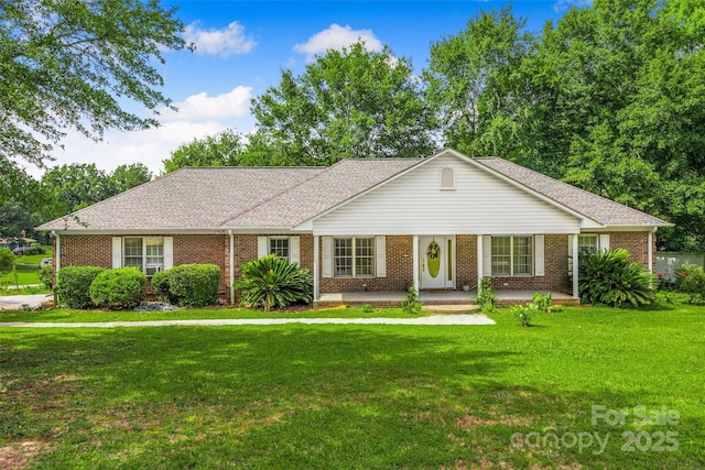 1010 Rainbow Cir, Catawba, SC 29704 - ranch-style home with a front yard, brick siding, and a shingled roof