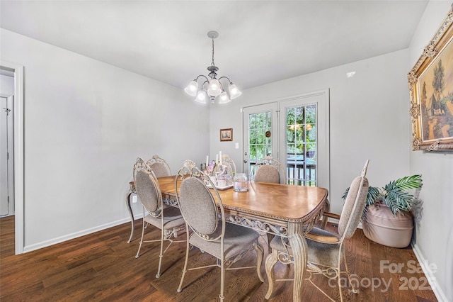 1010 Rainbow Cir, Catawba, SC 29704 - dining area featuring wood finished floors, a chandelier, and french doors
