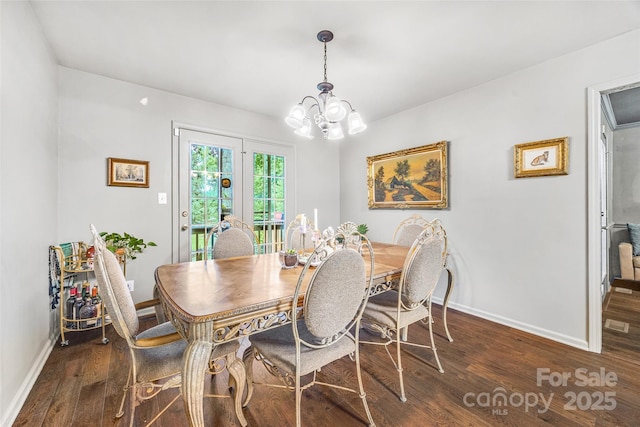 1010 Rainbow Cir, Catawba, SC 29704 - dining space with a chandelier and dark wood-style floors