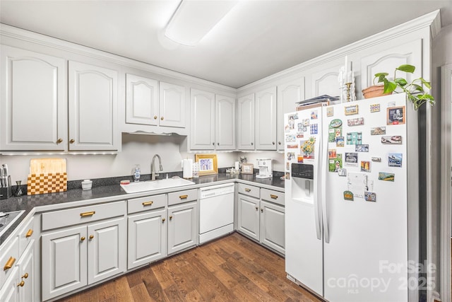 1010 Rainbow Cir, Catawba, SC 29704 - kitchen featuring white appliances, dark wood-style flooring, dark countertops, and white cabinetry