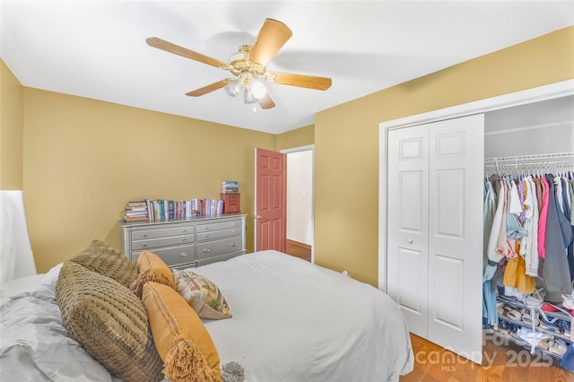 1010 Rainbow Cir, Catawba, SC 29704 - bedroom with a closet, wood finished floors, and ceiling fan