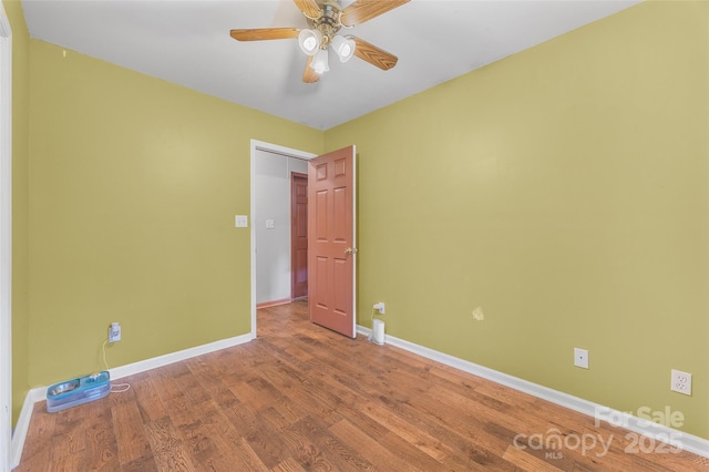1010 Rainbow Cir, Catawba, SC 29704 - spare room featuring wood finished floors and ceiling fan