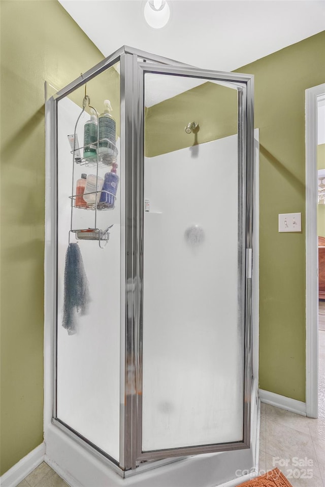 1010 Rainbow Cir, Catawba, SC 29704 - bathroom with a stall shower and tile patterned floors