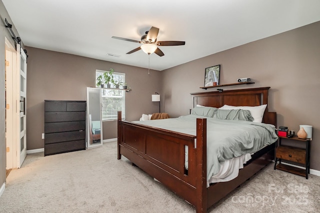 1478 Cannan Mountain Dr, Newton, NC 28658 - bedroom featuring light carpet and a ceiling fan