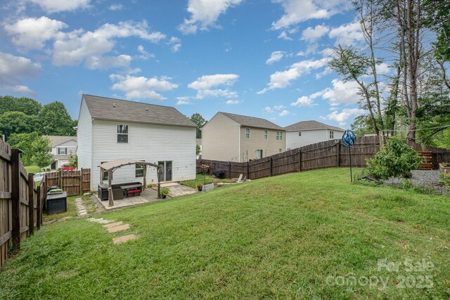 1478 Cannan Mountain Dr, Newton, NC 28658 - rear view of house featuring a fenced backyard, a patio, and a residential view