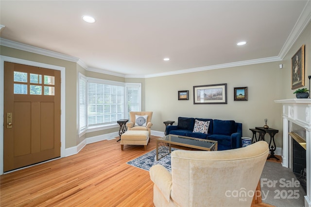806 S Point Rd, Belmont, NC 28012 - living room featuring ornamental molding, wood finished floors, a fireplace with flush hearth, and recessed lighting