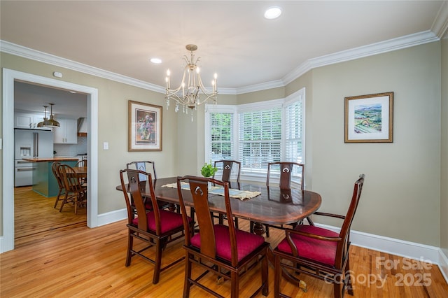 806 S Point Rd, Belmont, NC 28012 - dining space with a chandelier, light wood-type flooring, ornamental molding, and recessed lighting