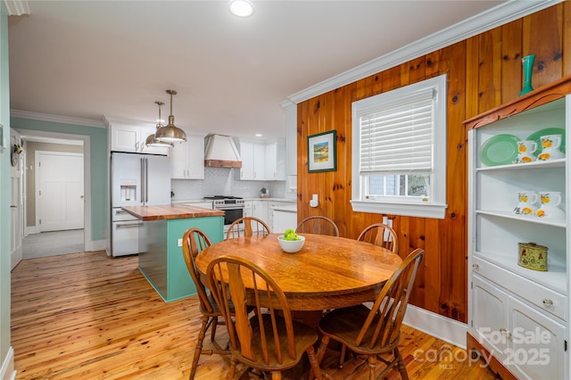806 S Point Rd, Belmont, NC 28012 - dining space featuring crown molding, light wood finished floors, and recessed lighting
