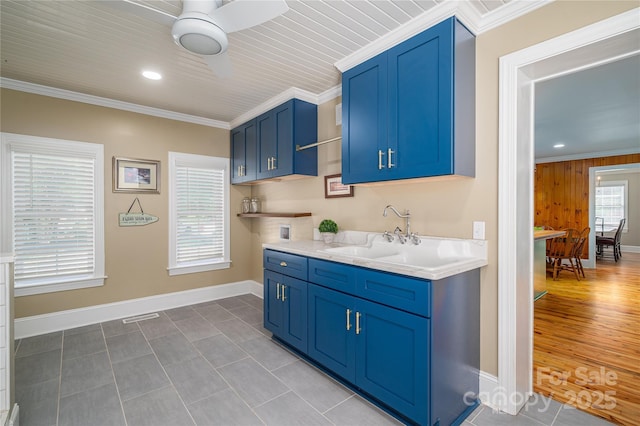 806 S Point Rd, Belmont, NC 28012 - kitchen featuring blue cabinets, open shelves, crown molding, light countertops, and a ceiling fan