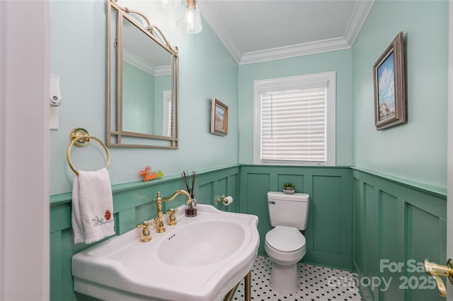 806 S Point Rd, Belmont, NC 28012 - half bathroom featuring crown molding, a decorative wall, and wainscoting