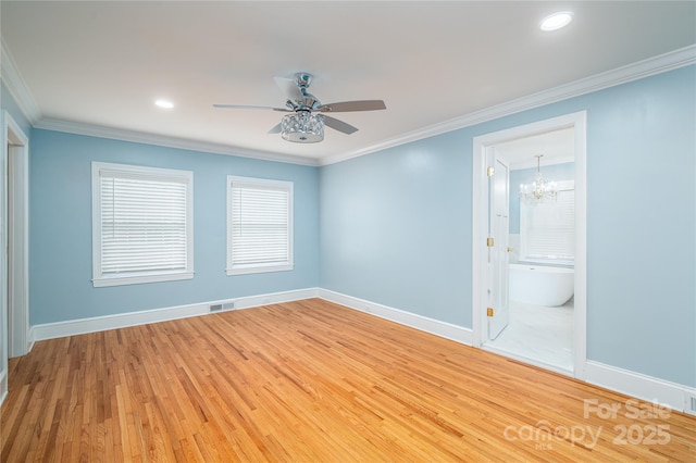 806 S Point Rd, Belmont, NC 28012 - unfurnished room with a chandelier, light wood-style flooring, a ceiling fan, crown molding, and recessed lighting