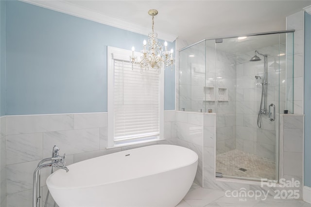 806 S Point Rd, Belmont, NC 28012 - full bath with a shower stall, tile walls, a freestanding bath, a chandelier, and crown molding