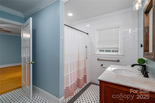 806 S Point Rd, Belmont, NC 28012 - full bath featuring vanity, ornamental molding, a shower with curtain, tile patterned floors, and tile walls