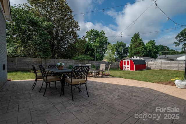806 S Point Rd, Belmont, NC 28012 - fenced backyard with outdoor dining area, a patio area, and a shed