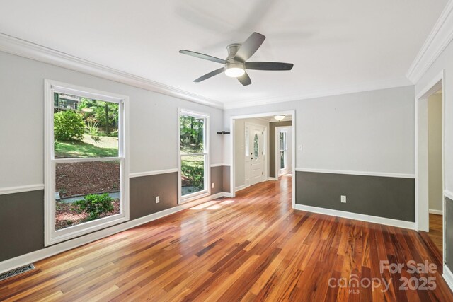 8 Hickory Ridge Ct, Clover, SC 29710 - empty room with ornamental molding, ceiling fan, and wood finished floors