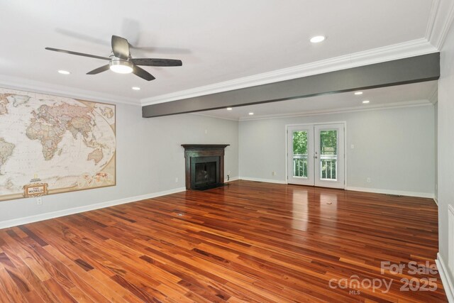 8 Hickory Ridge Ct, Clover, SC 29710 - unfurnished living room with wood finished floors, ornamental molding, ceiling fan, a fireplace with flush hearth, and recessed lighting