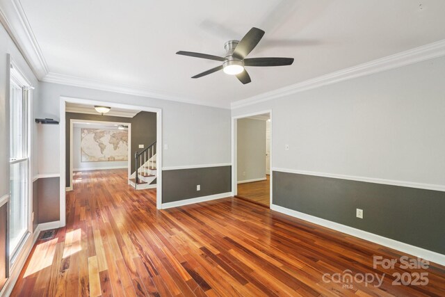 8 Hickory Ridge Ct, Clover, SC 29710 - spare room featuring ceiling fan, wood finished floors, crown molding, and stairs