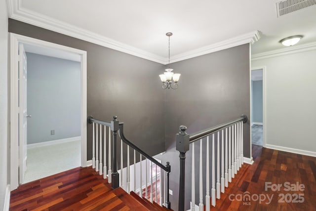 8 Hickory Ridge Ct, Clover, SC 29710 - stairway featuring wood finished floors, ornamental molding, and a chandelier