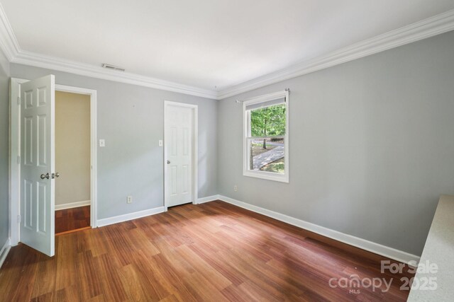8 Hickory Ridge Ct, Clover, SC 29710 - empty room featuring ornamental molding and wood finished floors