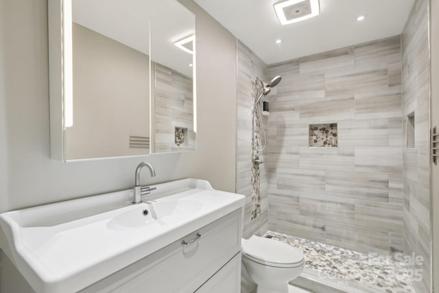 8 Hickory Ridge Ct, Clover, SC 29710 - bathroom featuring vanity, a tile shower, and recessed lighting