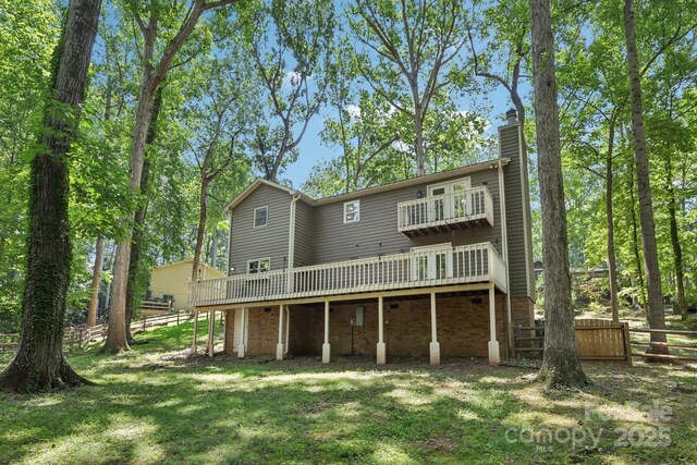 8 Hickory Ridge Ct, Clover, SC 29710 - rear view of property with a chimney, a wooden deck, and a balcony