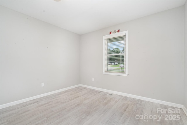 8107 Smith Rd, Kannapolis, NC 28081 - spare room featuring baseboards and light wood finished floors