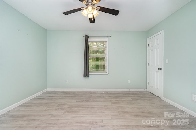 8107 Smith Rd, Kannapolis, NC 28081 - unfurnished room featuring light wood-style floors and ceiling fan