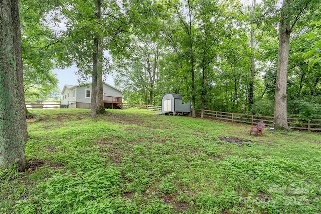 8107 Smith Rd, Kannapolis, NC 28081 - fenced backyard with a storage unit