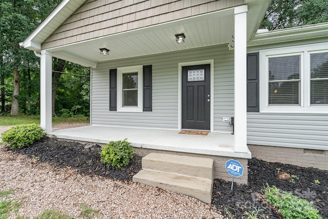 8107 Smith Rd, Kannapolis, NC 28081 - entrance to property featuring covered porch and crawl space