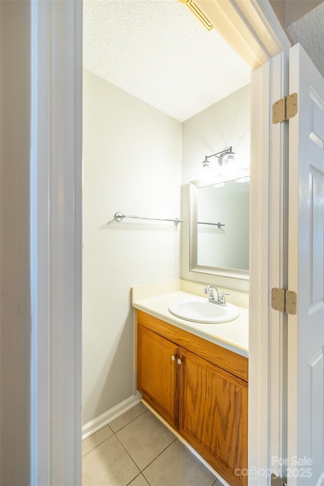1533 20th Ave NE, Hickory, NC 28601 - bathroom featuring vanity and tile patterned flooring
