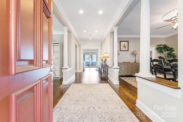 11 By The Wayside Dr, Columbus, NC 28722 - foyer entrance featuring ornate columns, ceiling fan, dark wood finished floors, crown molding, and recessed lighting