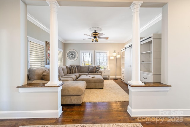 11 By The Wayside Dr, Columbus, NC 28722 - living room with ornate columns, dark wood-style floors, ornamental molding, and a ceiling fan