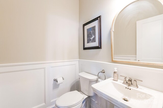 11 By The Wayside Dr, Columbus, NC 28722 - half bath with a wainscoted wall and a decorative wall