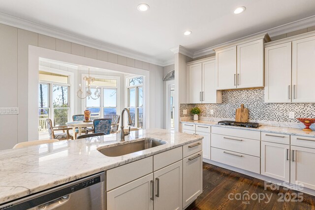 11 By The Wayside Dr, Columbus, NC 28722 - kitchen with stainless steel appliances, crown molding, dark wood-style floors, white cabinetry, and light stone countertops